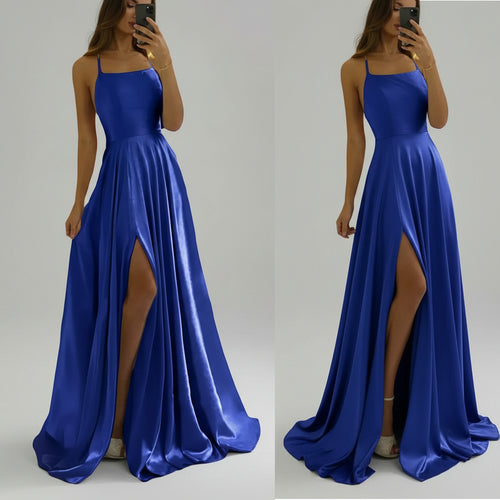 Blue evening gown with a slit on a white background