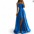 Blue evening gown with a slit on a white background
