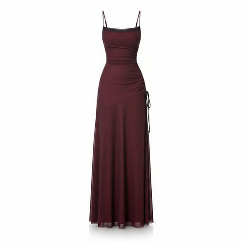 Burgundy evening gown with a slit on a white background