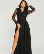 Woman wearing a black lace long-sleeve dress with a slit on a white background