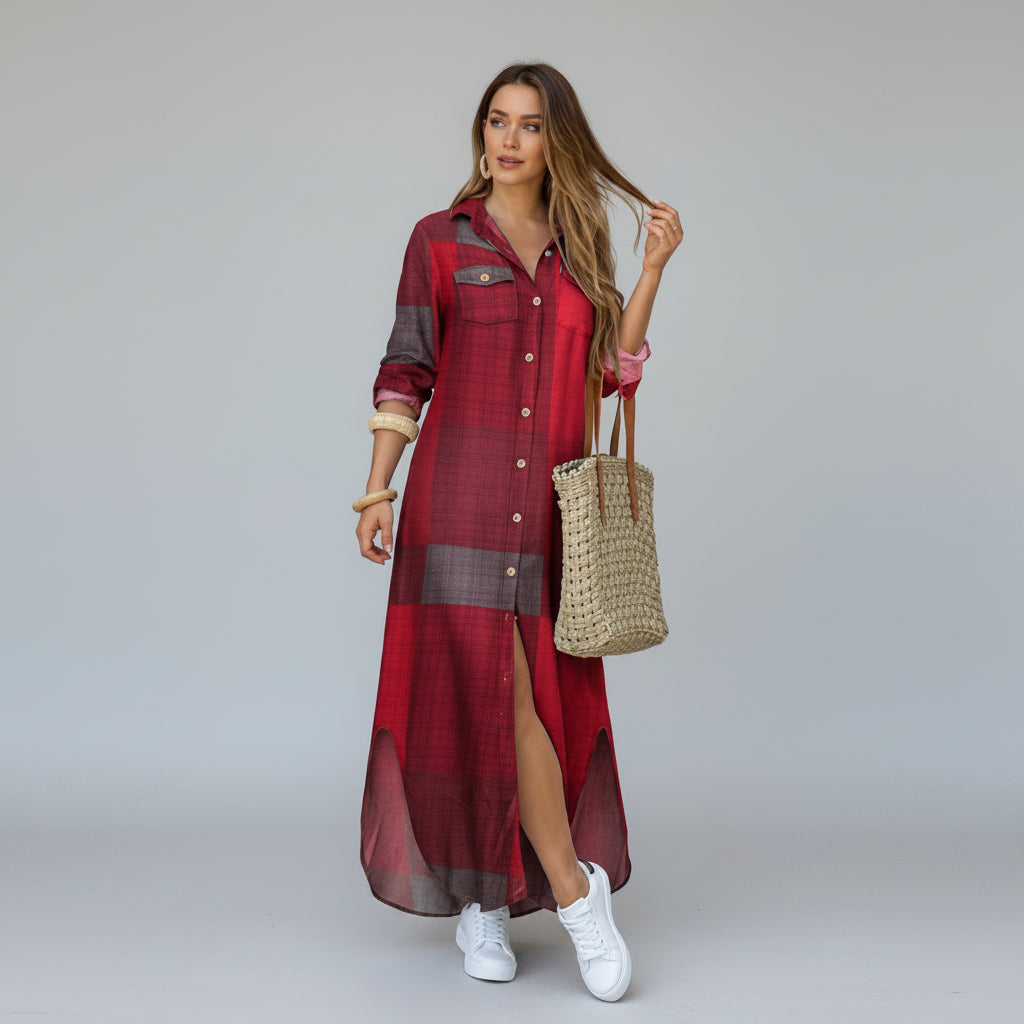 Woman wearing a red plaid dress with white sneakers and a straw bag, standing outside a store.