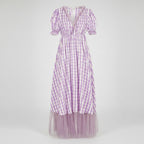Purple and white checkered dress with sheer overlay on a white background