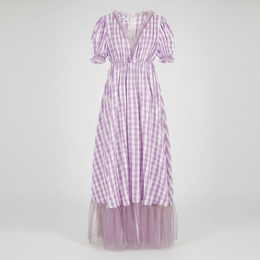 Purple and white checkered dress with sheer overlay on a white background